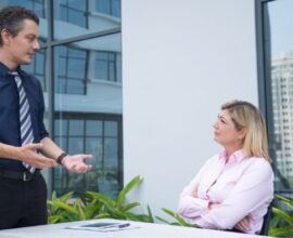 Estate attorney discussing will and trust documents with a client